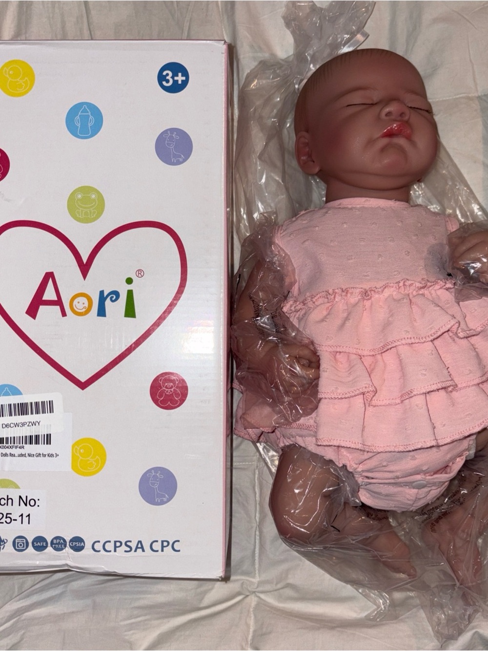 Baby Doll in Pink Ruffled Outfit - Realistic Newborn Toy